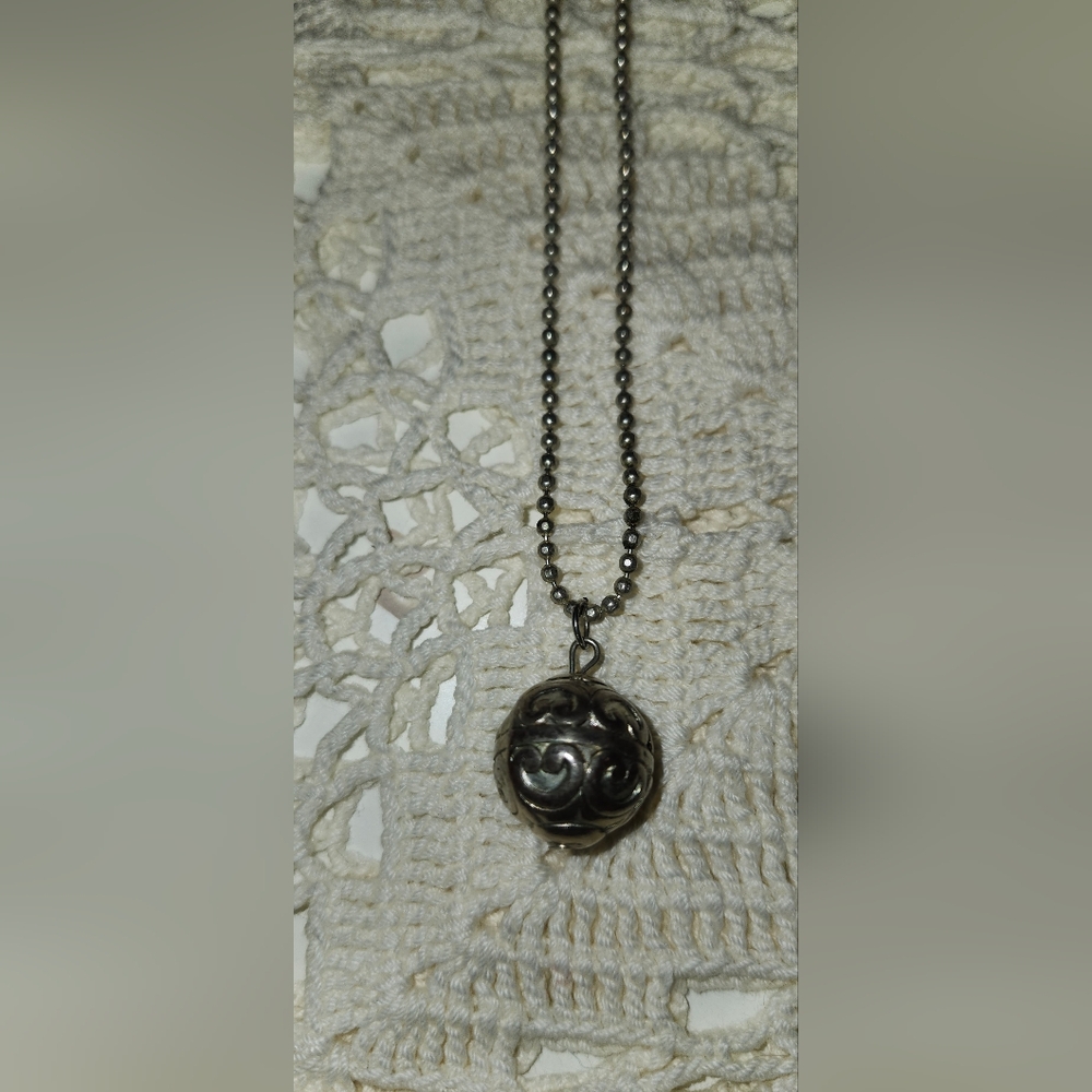Boho Silver-toned harmony ball pendant necklace, also known as a chime bell